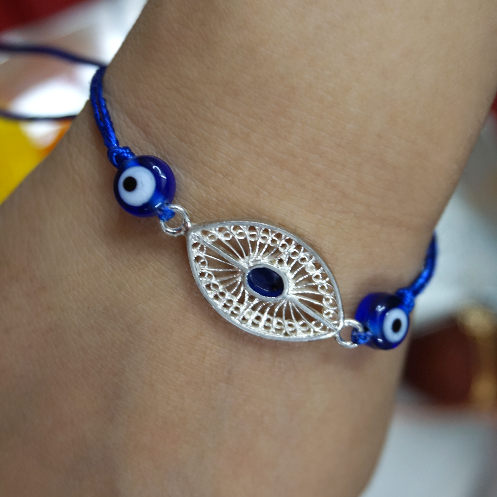 Silver Evil eye convertible Rakhi